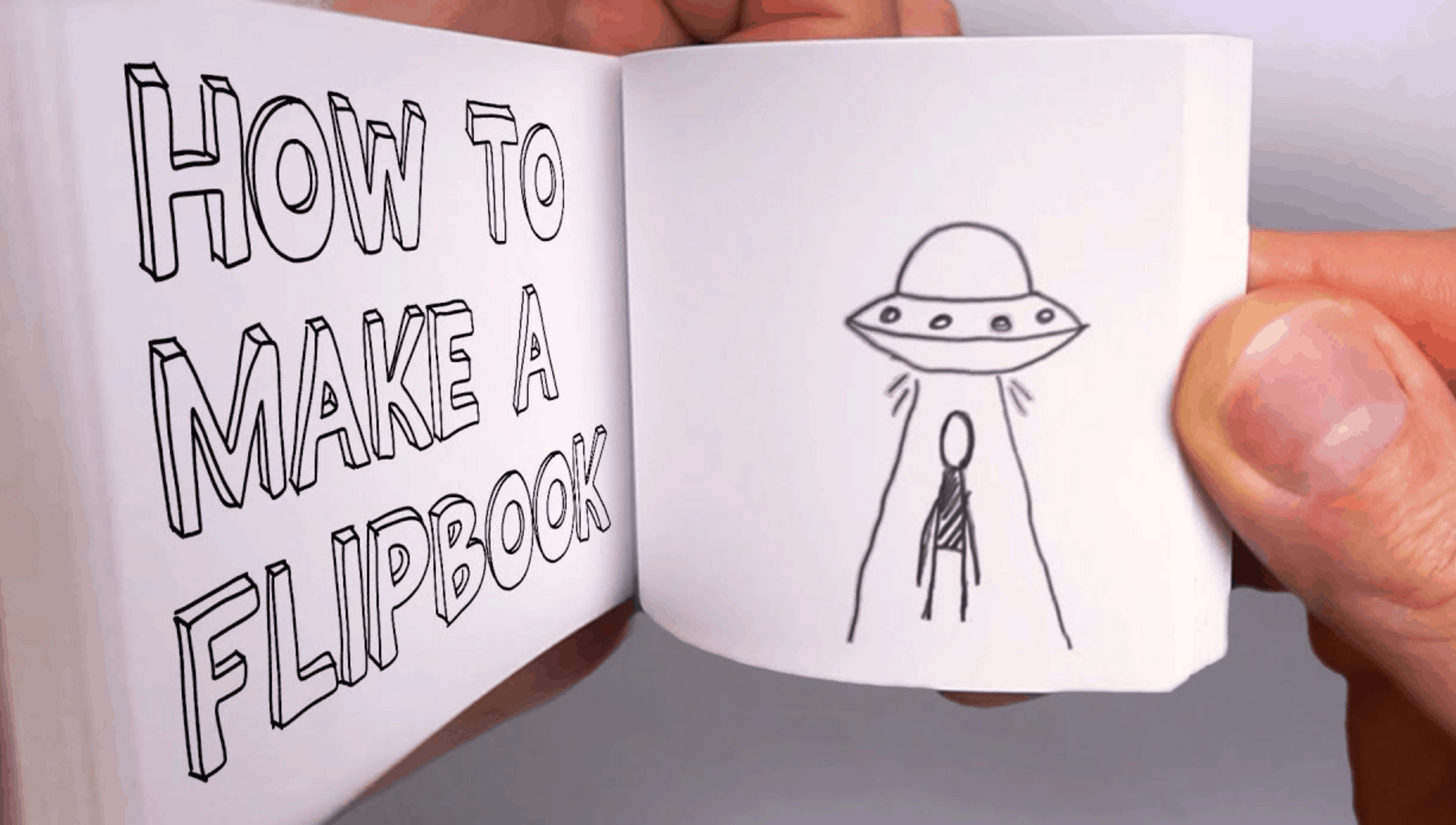 flipbook image of man under UFO